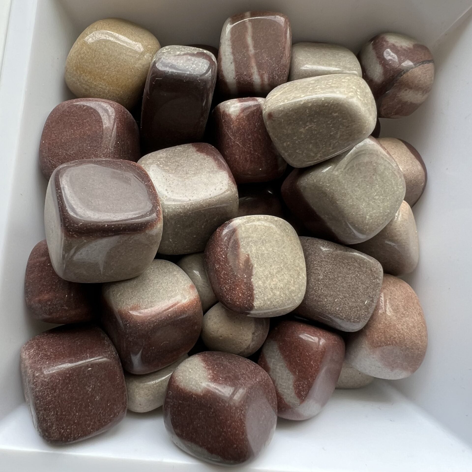 Shiva Lingam Tumbles image 1